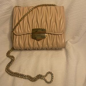 Pink and gold purse